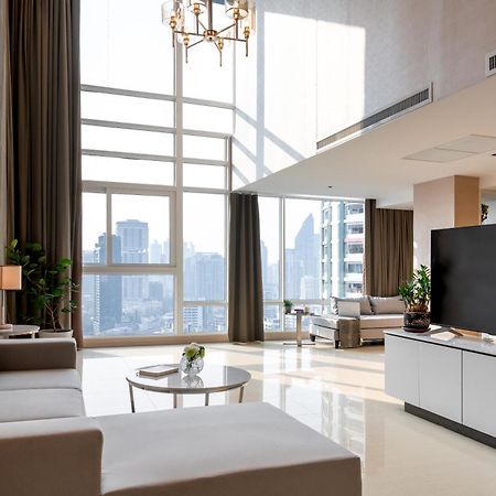 Jasmine 59 Hotel Bangkok Kültér fotó A living room in a luxury apartment