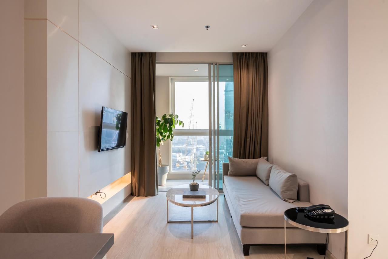 Jasmine 59 Hotel Bangkok Kültér fotó A living room in a micro apartment