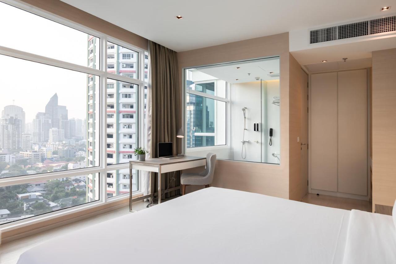 Jasmine 59 Hotel Bangkok Kültér fotó A bedroom at the hotel