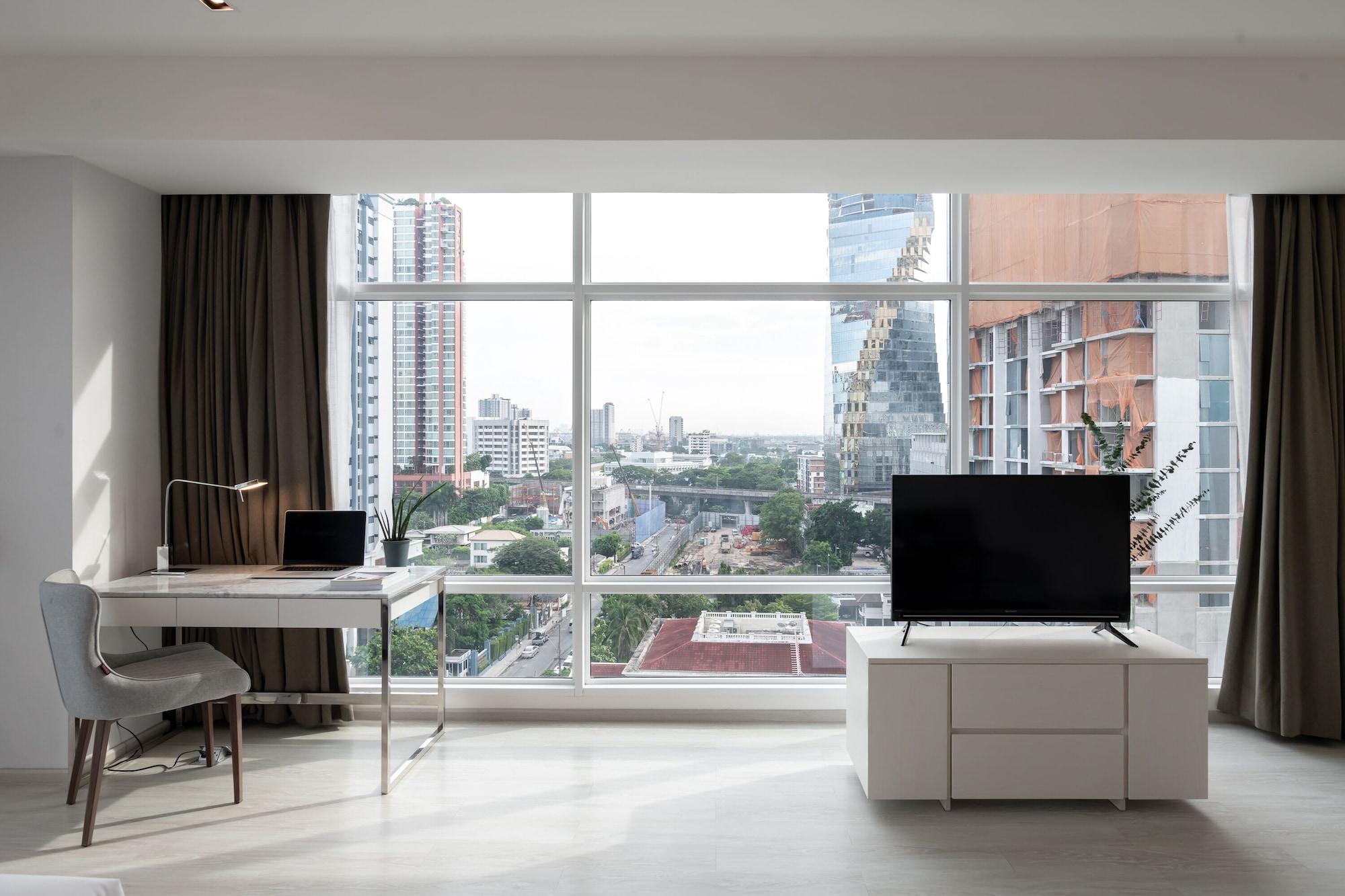Jasmine 59 Hotel Bangkok Kültér fotó A typical bedroom in a condominium